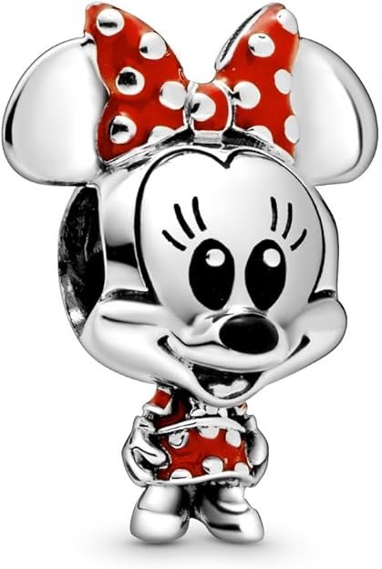 Este charm de Minnie Mouse con vestido y lazo de lunares de Disney está acabado a mano